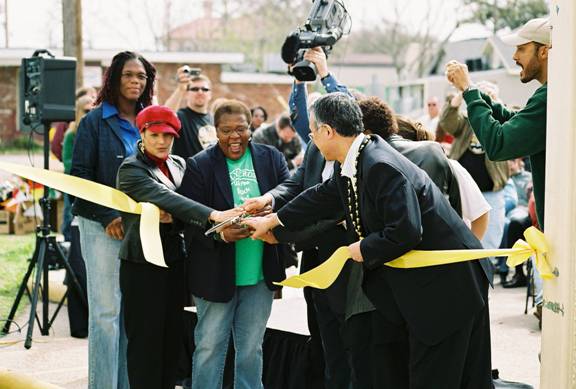 Cutting the Ribbon.  From left, Patricia Jones, City Councilwoman Willard Lewis, Pam Dashiell, Ron Kendra, and US President of Sharp