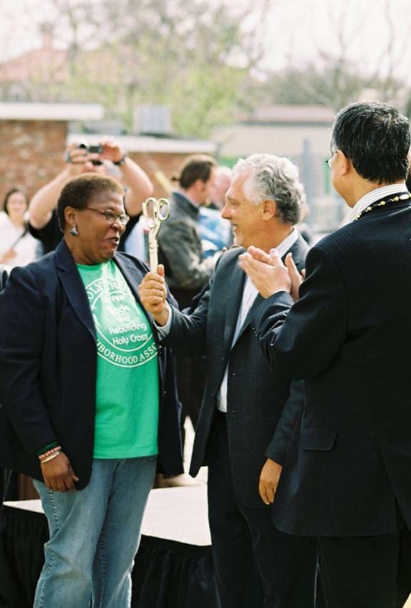 Ron giving Pam the "official scissors" with US President of Sharp Solar looking on